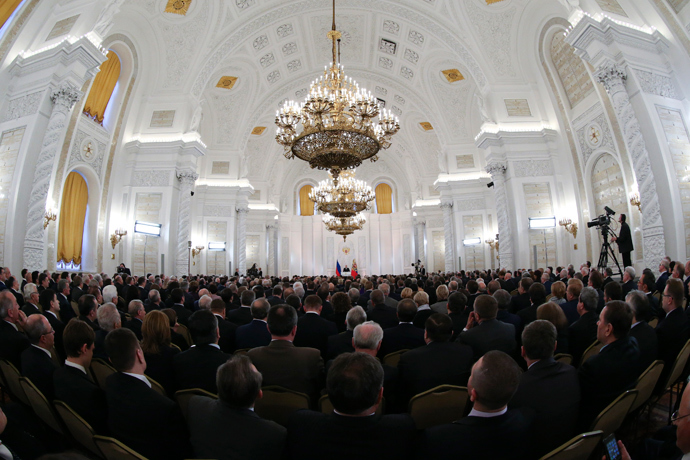L’assistance écoute le président de la Russie Vladimir Poutine, alors qu’il livre son discours annuel sur l’état de la nation au Kremlin, le 12 décembre 2013 – Reuters / Sergei Karpukhin